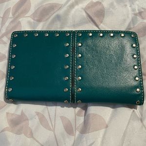 Michael Kors torquoise wallet. Snap closer